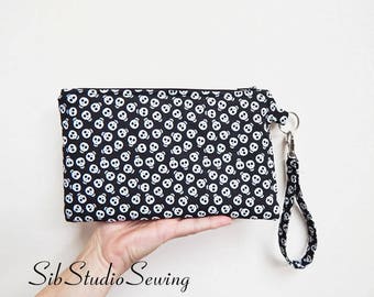 Skulls Smartphone Clutch, 9 x 5.5 inches, Fits iPhones 15 Pro, Plus Size Smartphones up to 7" Length, Inside Pockets, Glow in the Dark Purse