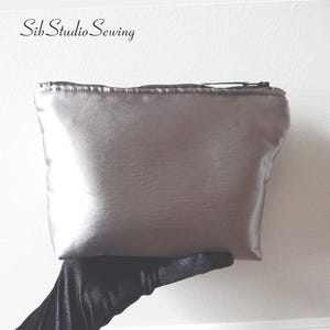 Silver Satin Makeup Clutch, Zipper Closure, 9 x 6 x 2 inches, Satin Lined, Inside Pockets