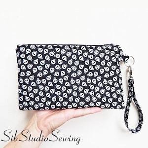 Cartera para smartphone con calaveras, 23 x 14 cm, compatible con iPhone 15 Pro y smartphones de tamaño grande de hasta 18 cm, bolsillos interiores, brilla en la oscuridad.