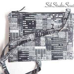 Skyscraper City Crossbody Bag: Fits iPhone 15 Pro, Adjustable Strap, 9 x 6.5 inches, Interior Pockets