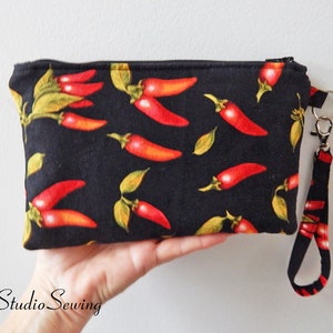 Spicy Peppers Smartphone Clutch: Padded Zipper Wristlet, 9 x 5.5 inches, Fits iPhone 15 Pro, Large Phone up to 7&quot; Length, Interior Pockets