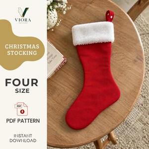 Puede incluir: Un calcetín navideño rojo con un puño blanco difuso y una pequeña presilla roja para colgar. El texto a la izquierda dice VIORA PATTERN, CHRISTMAS STOCKING, FOUR SIZE, PDF PATTERN e INSTANT DOWNLOAD, con un icono de descarga de PDF.