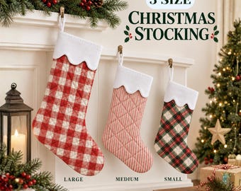 May include: Three Christmas stockings in large, medium, and small sizes, each featuring a white scalloped cuff. The large stocking has a red and white buffalo check pattern, the medium has red and white stripes, and the small has a red, green, and white plaid pattern.