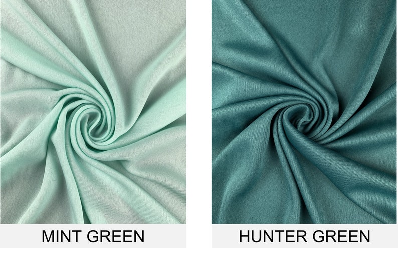 May include: Two fabric swatches, one in a light mint green color and the other in a darker hunter green color. Both swatches are folded and twisted to show the texture of the fabric.