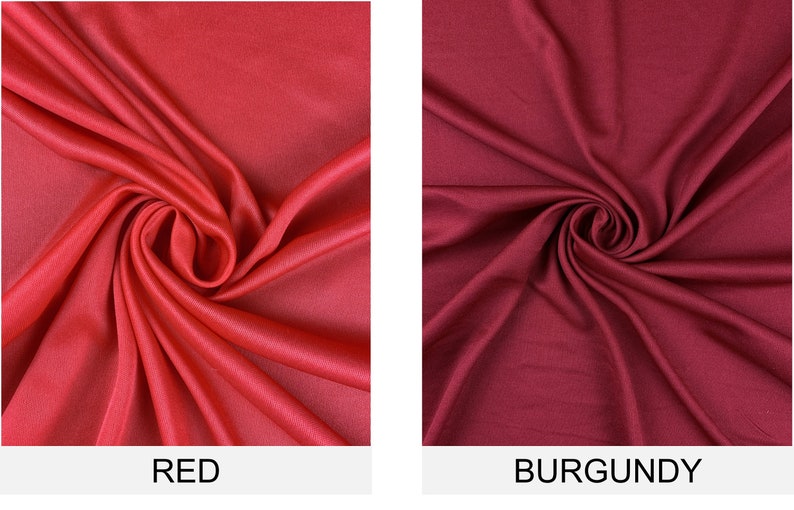 May include: Two fabric swatches, one red and one burgundy, are shown in a close-up view. The fabric is smooth and has a slight sheen.