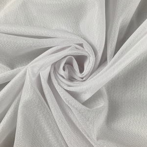 May include: White sheer fabric with a fine mesh texture. The fabric is draped and folded, creating a soft, flowing look.