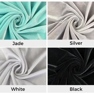 Pu&ograve; includere: Quattro campioni di tessuto in diversi colori: verde giada, argento, bianco e nero. Ogni campione &egrave; un primo piano della trama del tessuto.