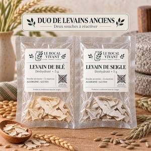 Peut inclure: Deux sachets en plastique transparent étiquetés Le Bocal Vivant contenant chacun 5g de levain déshydraté. Un sachet est marqué Levain de Blé et l'autre Levain de Seigle. Ils incluent un QR code, des avertissements allergènes et Duo de Levains Anciens.