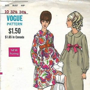 May include: Vintage Vogue pattern 7382 featuring three dress designs. The pattern includes a colorful floral print dress with a brown belt, a long olive green dress with a pink bow, and a white dress with a black belt. The pattern size is 10.