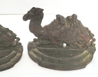 Pair of Vintage 1950's Cast Iron Seated Camel Bookends