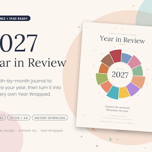 May include: A 2027 Year in Review journal featuring a multi-colored circular chart on a cream background. The cover displays the text 2027 Year in Review, Capture the moments, Remember the year, and includes details like 44 pages, Letter + A4, and 12 monthly recaps.