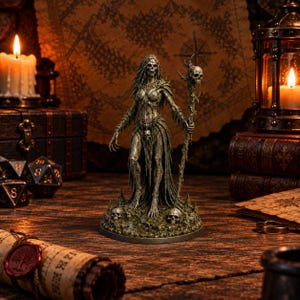 May include: A detailed miniature figurine of a skeletal figure with long hair, wearing tattered, moss-like robes and holding a staff topped with a skull. The figure stands on a base decorated with small skulls and textured, earthy terrain.
