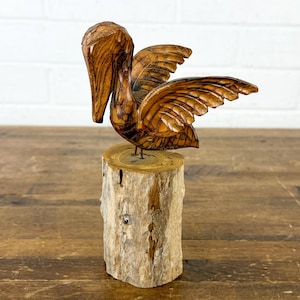 Vintage Carved Wood Pelican on Post – Rustic Coastal Decor with Stained Finish & Metal Legs