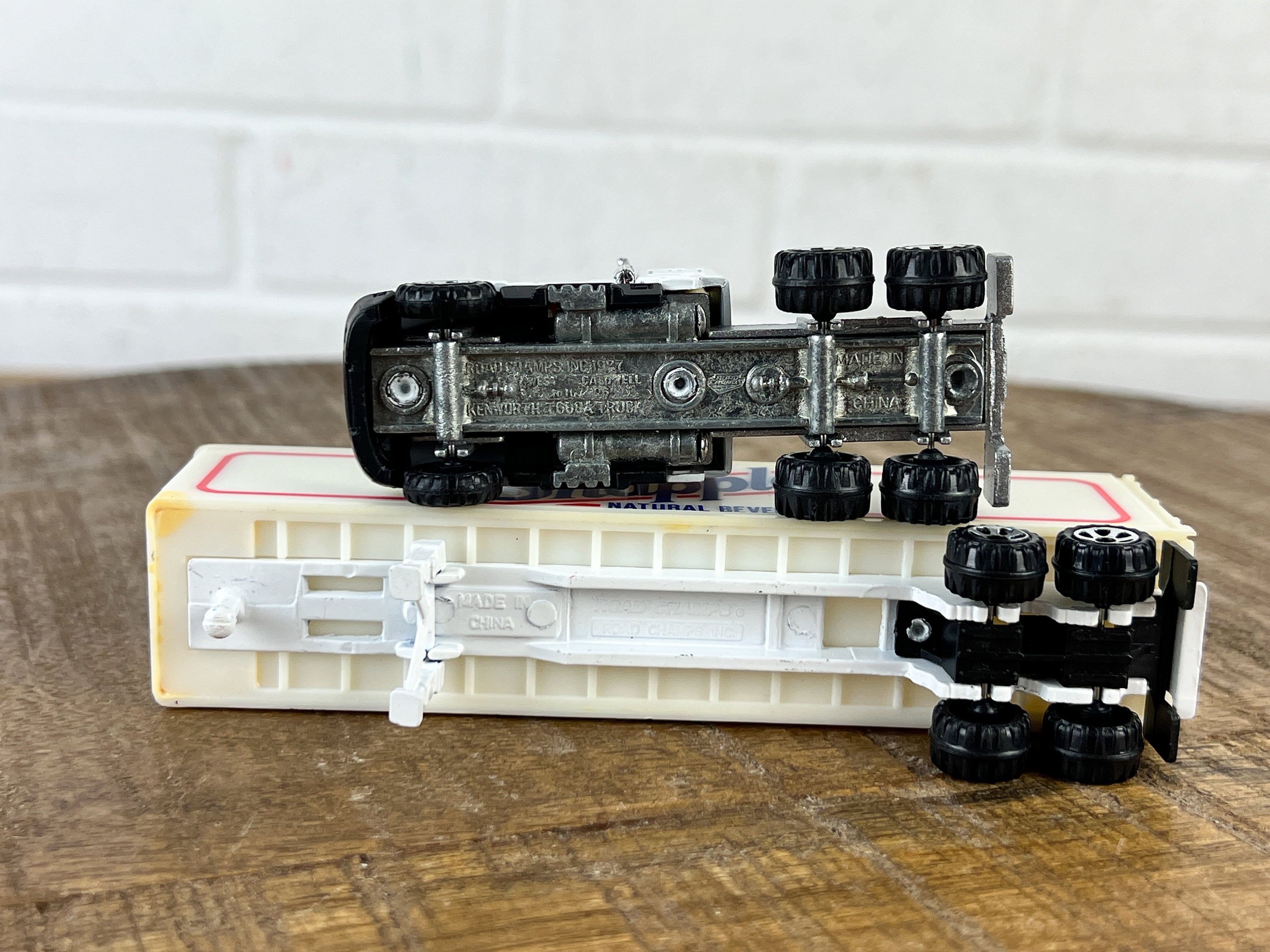 1987 Vintage Road Champs White Kenworth Semi Truck With Trailer