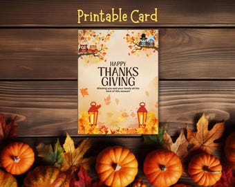 May include: A printable Thanksgiving card featuring two owls on a branch, two lanterns, and falling autumn leaves. The text reads: HAPPY THANKSGIVING, Wishing you and your family all the best of this season! The card has a light tan background with orange and yellow foliage.