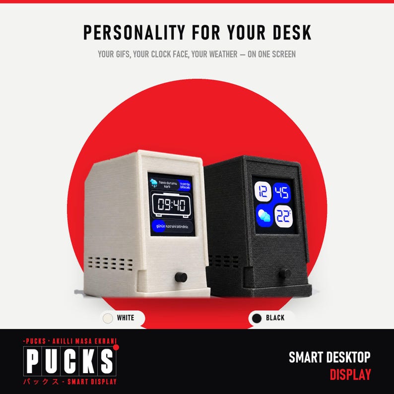 May include: Two smart desktop displays, one white and one black, featuring a square screen showing digital clock and weather data. Each unit has a small circular knob on the front and a textured finish. Text reads: PERSONALITY FOR YOUR DESK.