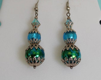 Green and blue lamp glass globe earrings with silver filigree accents. Christmas, gift, holiday.