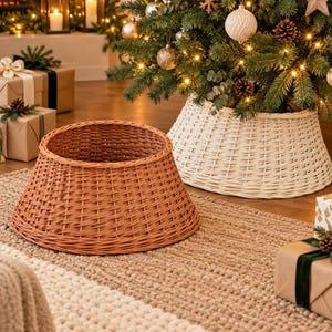 May include: A conical woven wicker tree collar in a natural light brown finish. The structure features a wide circular base that tapers toward a narrower top opening, designed to encircle the base of a Christmas tree for a clean look.