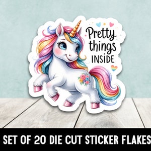 May include: A set of 20 die cut sticker flakes featuring a colorful unicorn with a rainbow mane and tail. The unicorn has a pink nose and hooves and is standing on all fours. The text "Pretty things inside" is written in black lettering above the unicorn.
