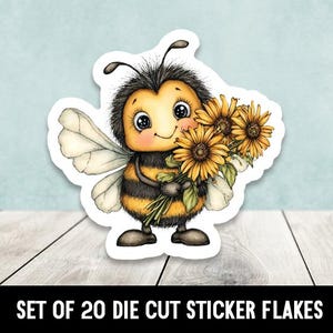 May include: A die-cut sticker featuring a cartoon bee holding sunflowers. The bee has a yellow and black striped body, large eyes, and a smiling expression. The sticker is on a white background, with the text "SET OF 20 DIE CUT STICKER FLAKES" at the bottom.