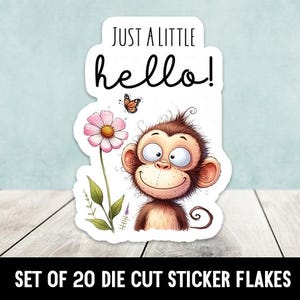 May include: A set of 20 die-cut sticker flakes featuring a cartoon monkey with a pink flower and a butterfly. The monkey is smiling and has big eyes. The text "Just a little hello!" is written above the monkey.