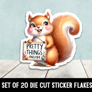 May include: A set of 20 die-cut sticker flakes featuring a cute cartoon squirrel holding a sign that says "Pretty Things Inside".