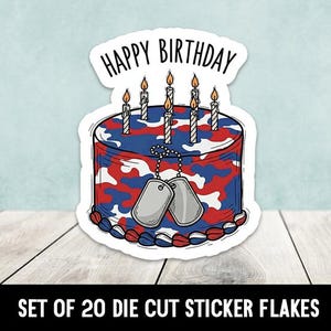 May include: A die-cut sticker featuring a birthday cake design with red, white, and blue camouflage pattern. The cake has lit candles and dog tags. The words "HAPPY BIRTHDAY" are at the top. The bottom text reads "SET OF 20 DIE CUT STICKER FLAKES".