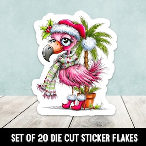 May include: A die-cut sticker featuring a pink flamingo wearing a red Santa hat with white trim, a patterned scarf, and red high-heeled shoes. The flamingo stands next to a potted palm tree decorated with lights. Text reads: SET OF 20 DIE CUT STICKER FLAKES.