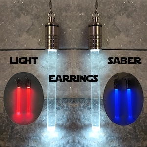LIGHT UP Lightsaber Earrings Ahsoka - Clear LED Star Wars - Stainless Steel, Battery powered, Nickel-Free Hypoallergenic, Geek Nerd Birthday