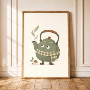 May include: A framed wall art print featuring a cartoon sage green teapot with a smiling face, wearing a beige and white checkered scarf. The teapot has a brown handle, small brown feet, and is surrounded by steam and a small brown mushroom.