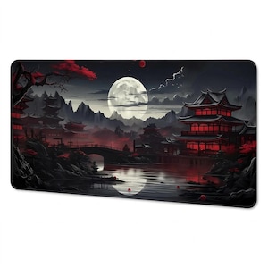 May include: A rectangular desk mat featuring a nighttime landscape illustration of a pagoda complex by a river. The scene includes a large full moon, dark mountains, red-lit buildings, a stone bridge, and red foliage against a black sky.