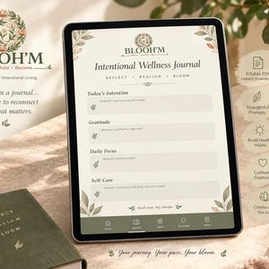 May include: A digital tablet displaying an Intentional Wellness Journal with sections for Today's Intention, Gratitude, Daily Focus, and Self-Care. The screen features the BLOOH'M logo, floral accents, and a navigation bar at the bottom. The interface is cream-colored with dark green text and botanical illustrations.