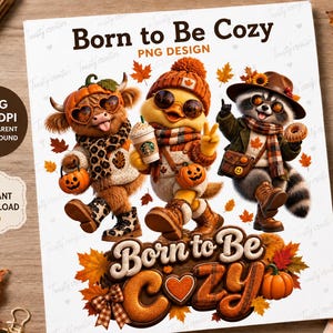 Peut inclure: Un design graphique numérique représentant une vache highland, un canard et un raton laveur portant des vêtements et accessoires d'automne. Le texte indique Born to Be Cozy. Les personnages sont entourés de feuilles, citrouilles et café.