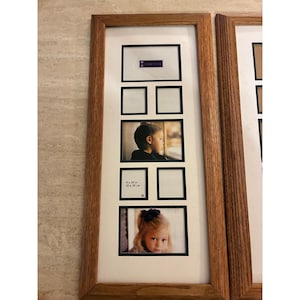 May include: A vertical collage picture frame with a light brown wood finish and a white mat board. The frame features multiple rectangular openings for photos, including two portrait photos of children and text reading 8 x 20 in 20 x 50 cm.