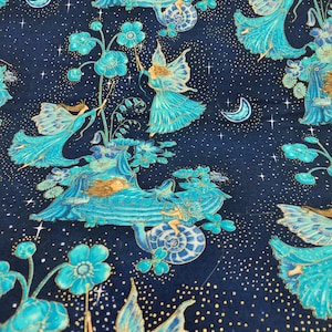 May include: Dark blue fabric with a repeating pattern of fairies, flowers, and crescent moons. The fairies are depicted in shades of teal and gold, with flowing gowns and wings. The background is a starry night sky.