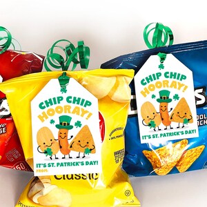 May include: Three bags of chips with printable gift tags that say "Chip Chip Hooray! It's St. Patrick's Day!" The tags feature a cartoon chip and dip with shamrock hats.