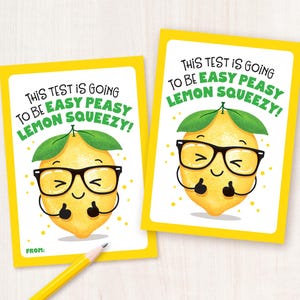 May include: Two printable cards with a yellow background and a cartoon lemon wearing glasses and giving a thumbs up. The text on the cards reads "This test is going to be easy peasy lemon squeezy!"