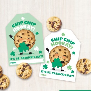 May include: Two printable gift tags featuring a cartoon chip cookie holding a shamrock. The tags are green and white with the text "Chip Chip Hooray! It's St. Patrick's Day!"