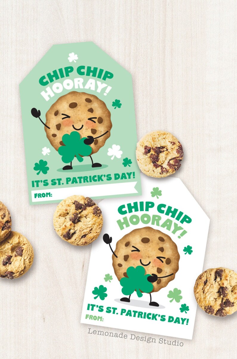 May include: Two printable gift tags featuring a cartoon chocolate chip cookie holding a shamrock and the text "Chip Chip Hooray! It's St. Patrick's Day!"