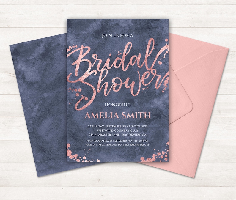 May include: A blue and rose gold bridal shower invitation with a watercolor background and gold glitter accents. The invitation reads "Join us for a Bridal Shower Honoring Amelia Smith" and includes the date, time, location, and RSVP information.