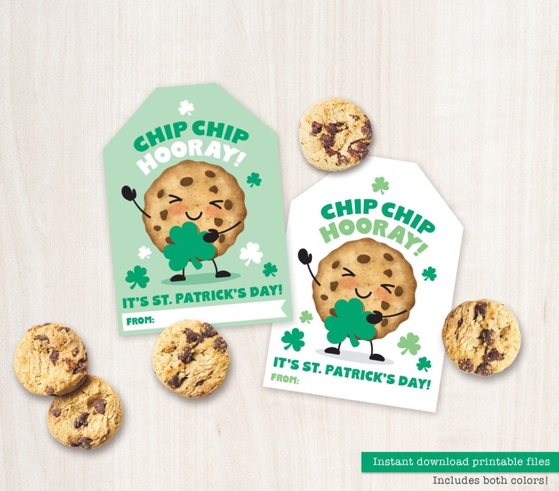 May include: Two printable gift tags featuring a cartoon chip cookie holding a shamrock. The tags are green and white with the text "Chip Chip Hooray! It's St. Patrick's Day!"
