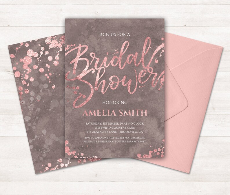 May include: A blush pink and gray bridal shower invitation with rose gold foil lettering. The invitation reads "Join us for a Bridal Shower Honoring Amelia Smith" and includes the date, time, location, and RSVP information.