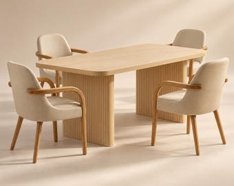 May include: A light wood dining table with a rectangular top and two fluted, vertical-slat pedestal bases, accompanied by four armchairs featuring light wood frames and upholstered, cream-colored fabric seats and backrests.