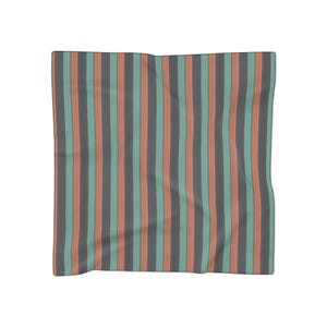 May include: A square scarf featuring a repeating vertical striped pattern in alternating colours of muted teal, dark charcoal grey, and soft salmon orange. The fabric displays a consistent, flat weave with clean, straight lines throughout the design.