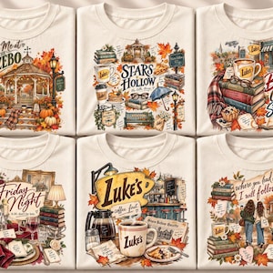 May include: A collection of six cream-colored t-shirts, each featuring a unique, detailed graphic print related to Stars Hollow. The designs include a gazebo, stacks of books, coffee mugs labeled Luke's, autumn leaves, and various text elements.