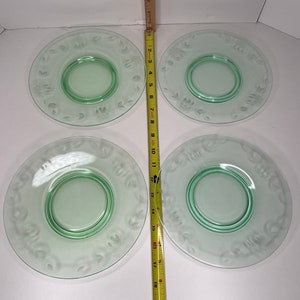 4 round etched plates 8.25 inches uranium glass