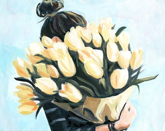 Floral print of a girl holding a large bunch of yellow tulips.