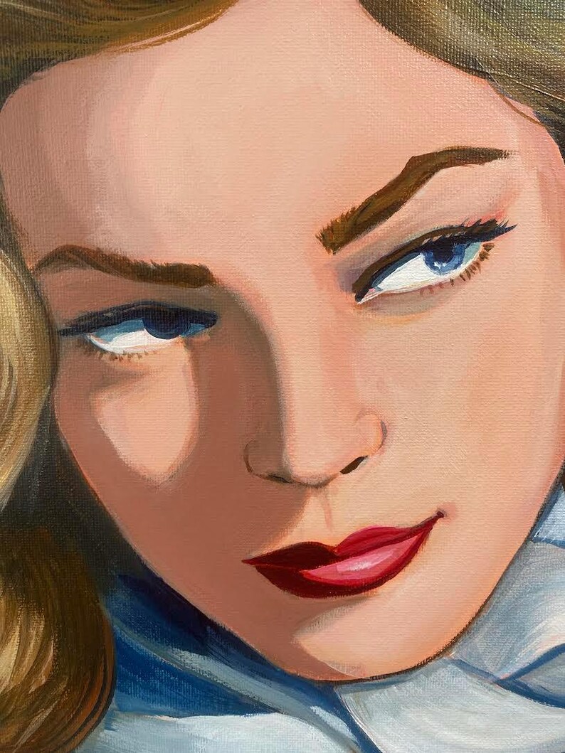 May include: Close-up of a woman's face with blue eyes and red lipstick. The woman is looking to the side with a slight smile. Her hair is blonde and styled in waves.
