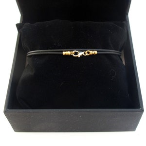 14 kt geelgouden zwarte siliconen wikkelarmband heren dames