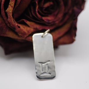 Gemini symbol pendant